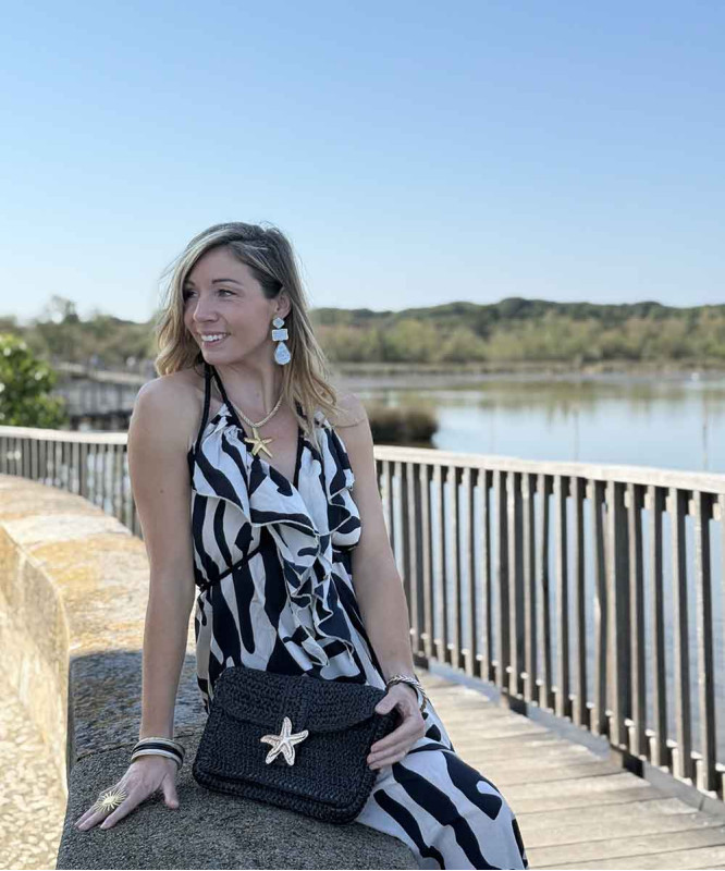 Pochette noire étoile de mer dorée